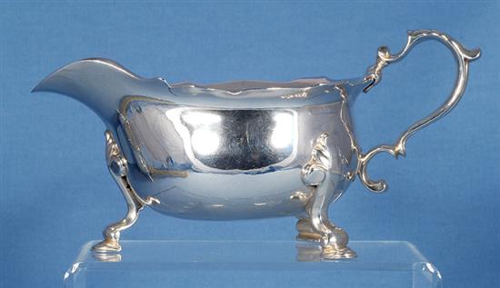 A pair of George II silver sauce boats, attributed to Joseph Sanders, length 195mm, weight 24.4 oz/760grms.